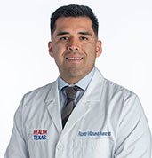 Ricardo Villanueva MD in white coat