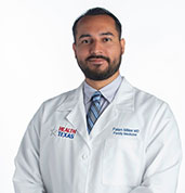 Dr. Falen MD in white coat
